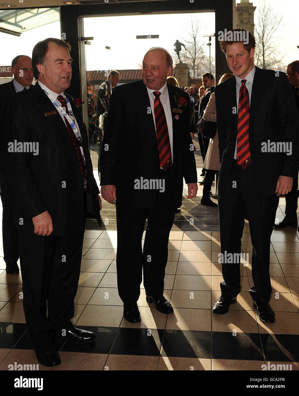 Prince Harry (right), newly appointed vice patron of England's Rugby Football Union (RFU), arrives for a reception and lunch at Twickenham Stadium ahead of the RBS 6 Nations match between England and Wales. Stock Photo