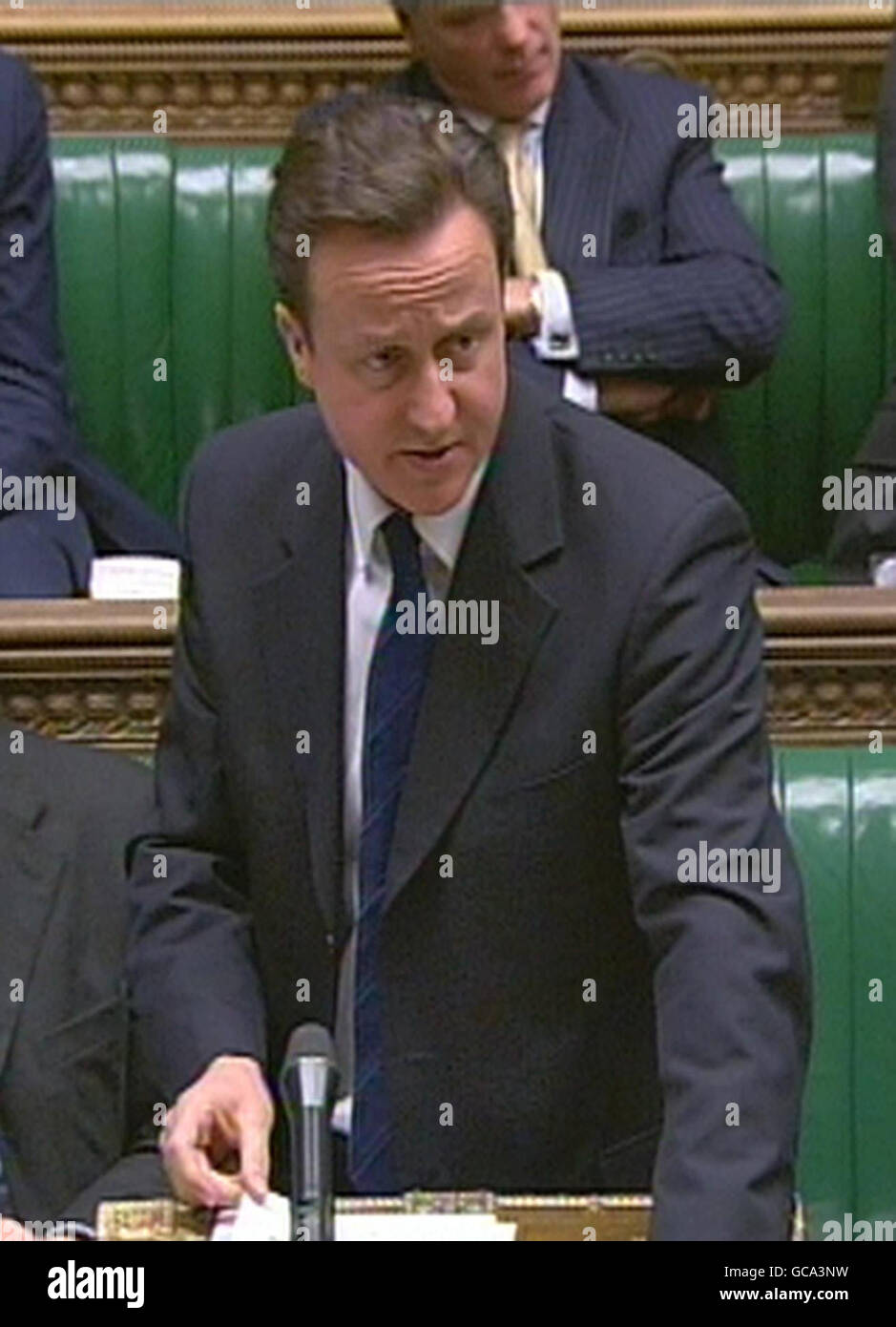 Leader of the Opposition David Cameron responds to Prime Minister Gordon Brown after he gave a statement to the House of Commons, London, where he said that the last loyalist paramilitary organisation to hold arms, the South-East Antrim UDA, had this afternoon 'completed their decommissioning'. Stock Photo