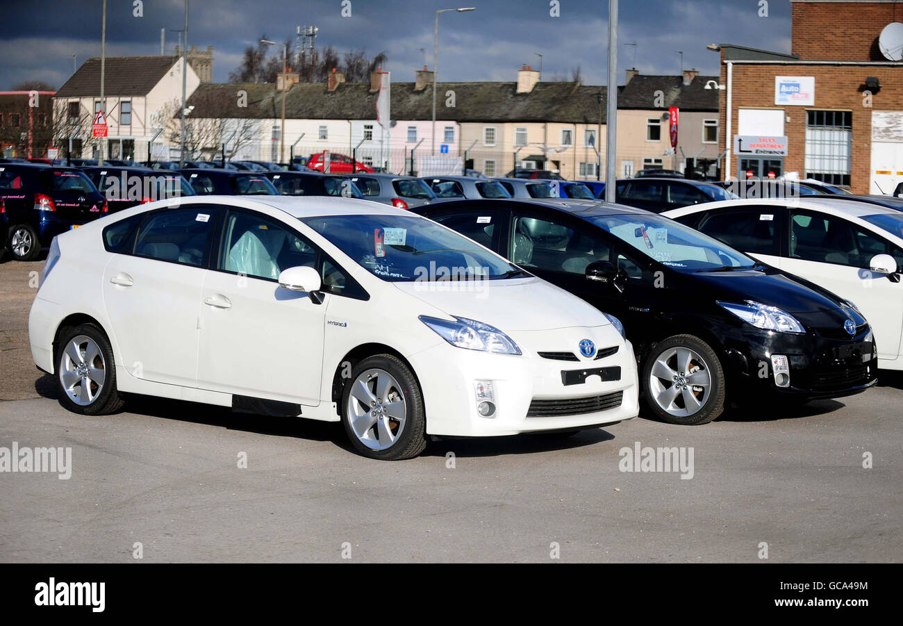 Toyota Prius hybrid cars inside a compound near a Toyota showroom in Burton on Trent, Staffordshire. Stock Photo