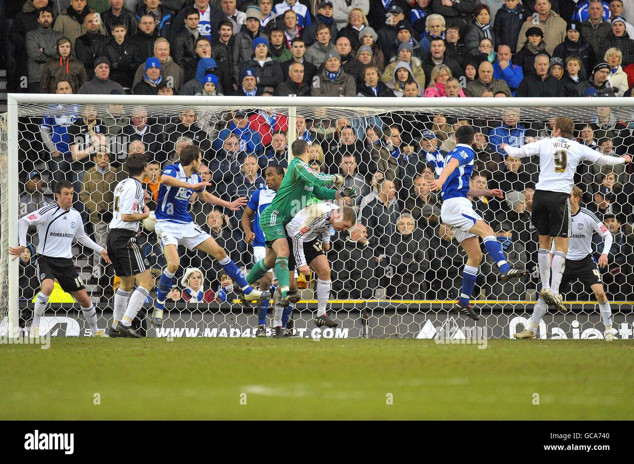 Soccer - FA Cup - Fifth Round - Derby County v Birmingham City - Pride Park Stadium. Birmingham City's Scott Dann (right of centre) scores his sides first goal of the game Stock Photo