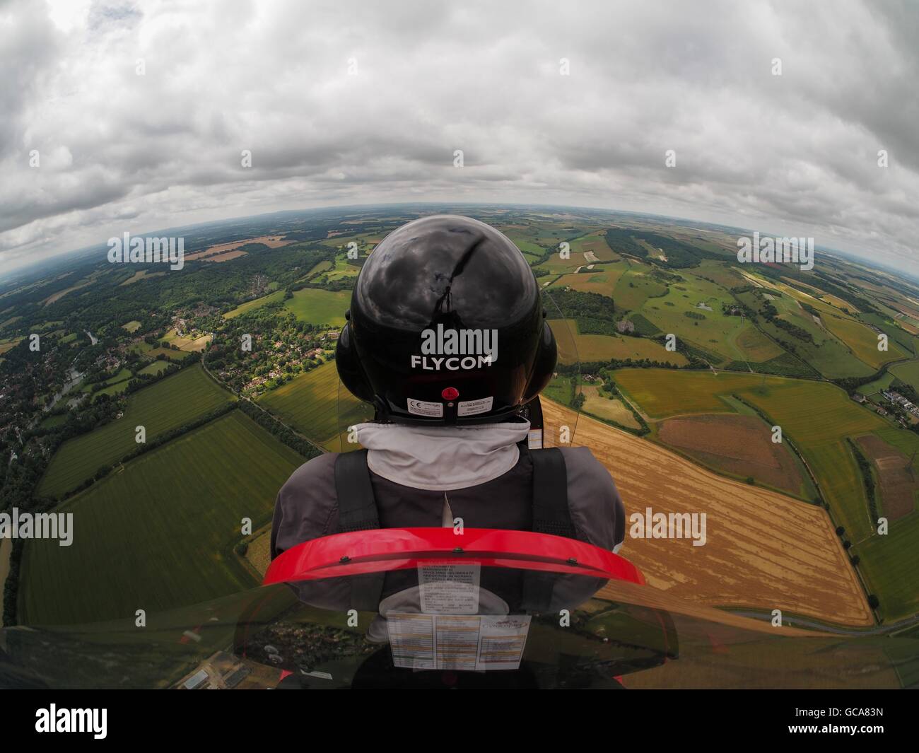flying a gyrocopter above Oxfordshire UK Stock Photo