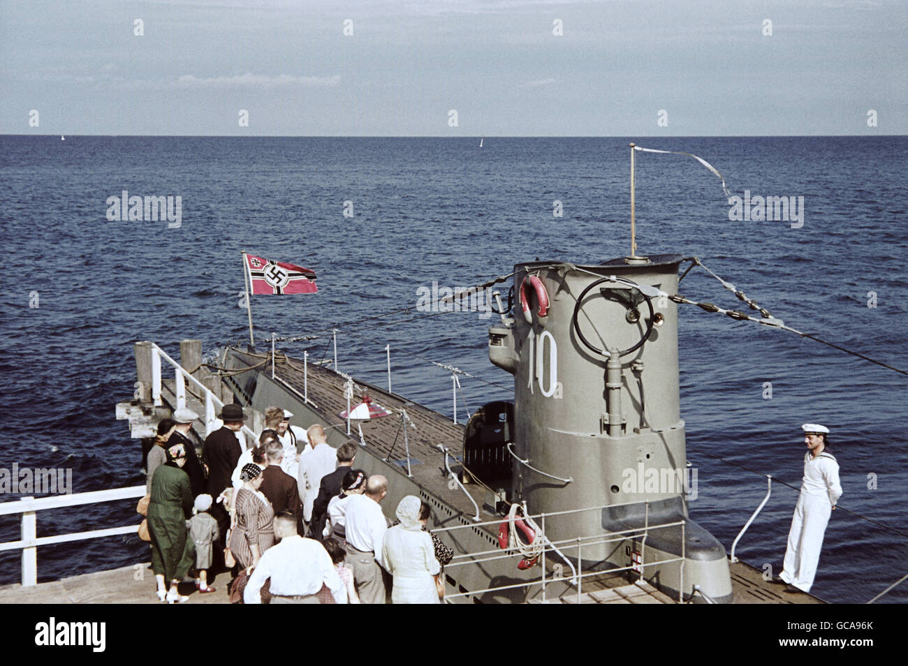 Nazism / National Socialism, military, navy, German submarine U-10, Sellin, Germany, 28.7.1938, Unterseeboot, U 10, Rügen island, people, tourists, looking at, attraction, Europe, German Reich, Mecklenburg-Vorpommern, Baltic Sea, pier, flag, swastika, Third Reich, National Socialism, Rugen, Ruegen, historic, historical, 1930s, 30s, 20th century, Additional-Rights-Clearences-Not Available Stock Photo