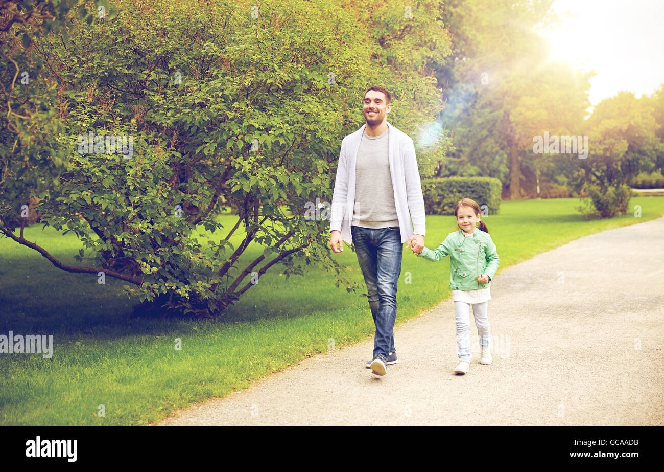 happy family walking in summer park Stock Photo - Alamy