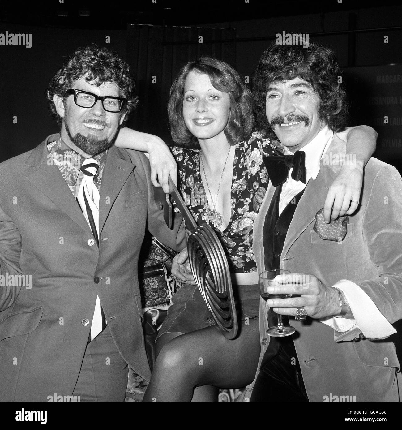 An Australian gets into the Common Market act. Television entertainer Rolf Harris (left) and actor Peter Wyngarde ('Jason King') flank Miss TV Europe 1973, after her election at ATV's Elstree Studios here tonight. Stock Photo