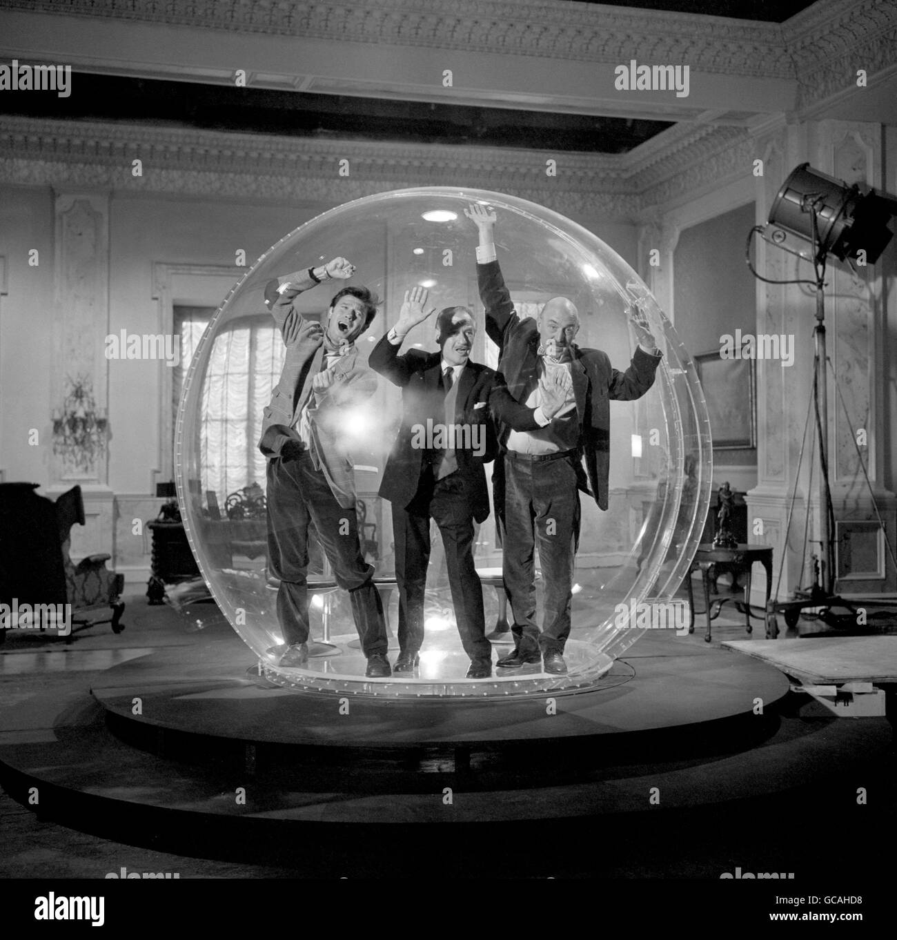 Actors (l-r) Laurence Harvey, Eric Portman and Lionel Jeffries, in The Dome, used in scenes from 'The Spy with a Cold Nose' at Shepperton Studios. Stock Photo
