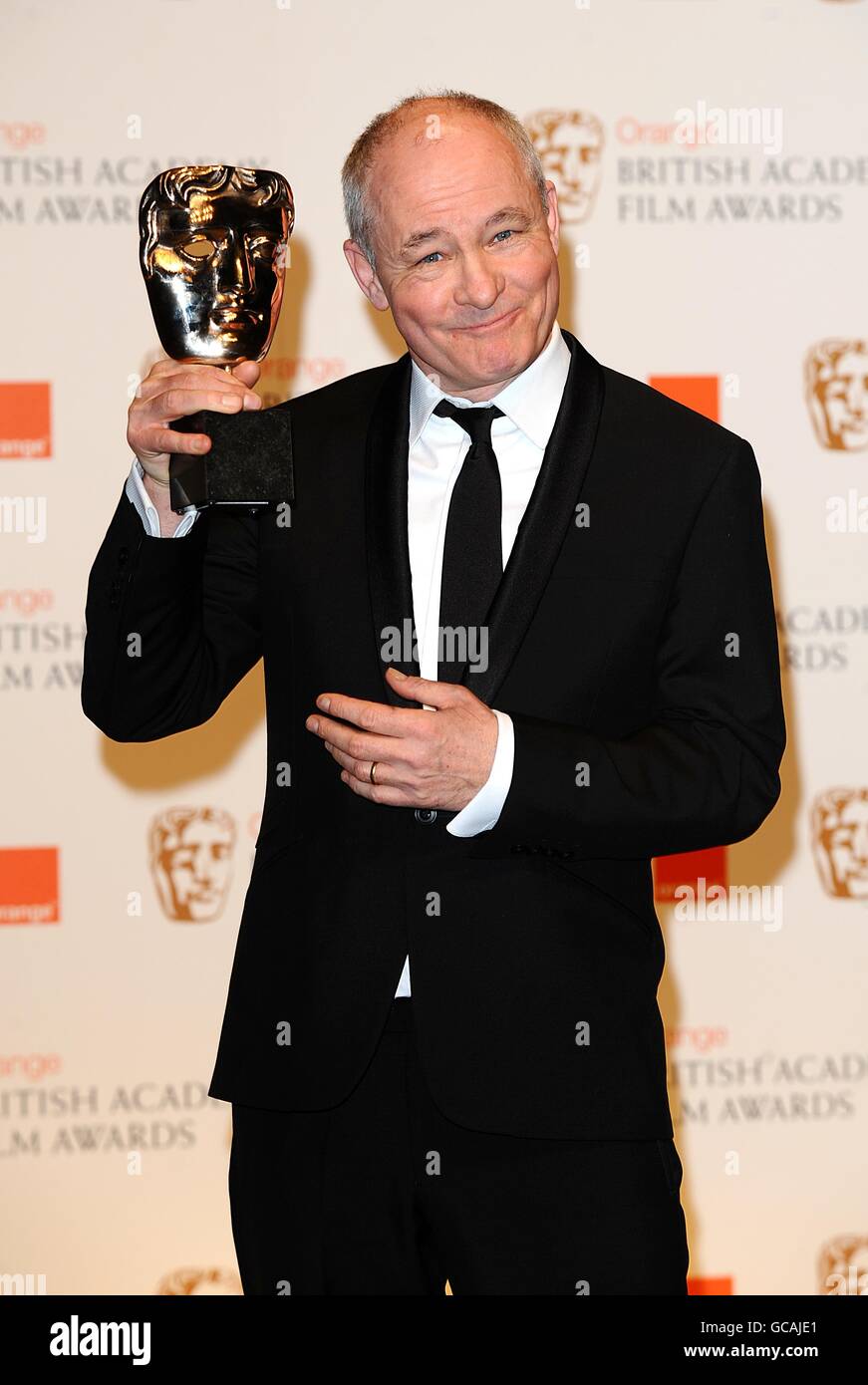 Barry Ackroyd with the award for Best Cinematography, received for The Hurt Locker at the Orange British Academy of Film Awards, at The Royal Opera House, London. Stock Photo