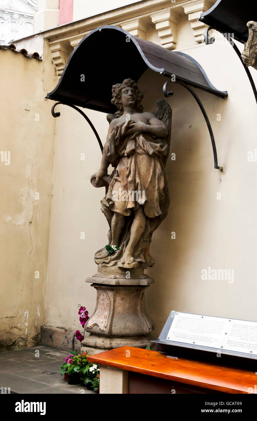 Religious statue outside a church in the centre of Prague (Praha) in the Czech Republic. Stock Photo