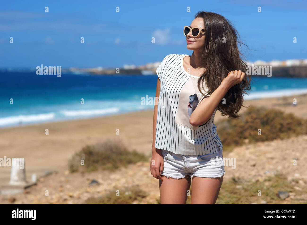 Stylish girl at beach Stock Photo - Alamy