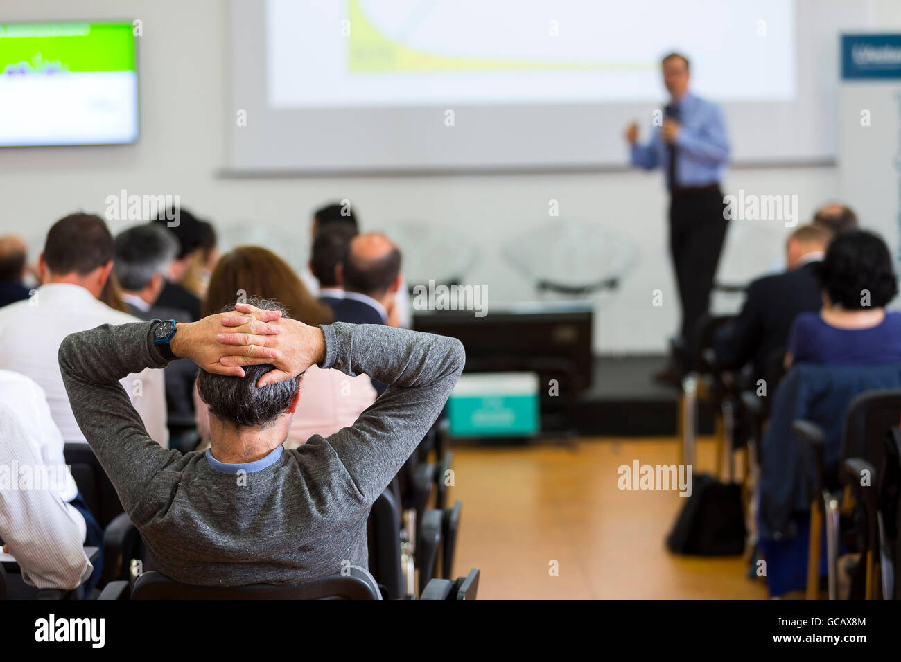 Business man during a conference presentation Stock Photo