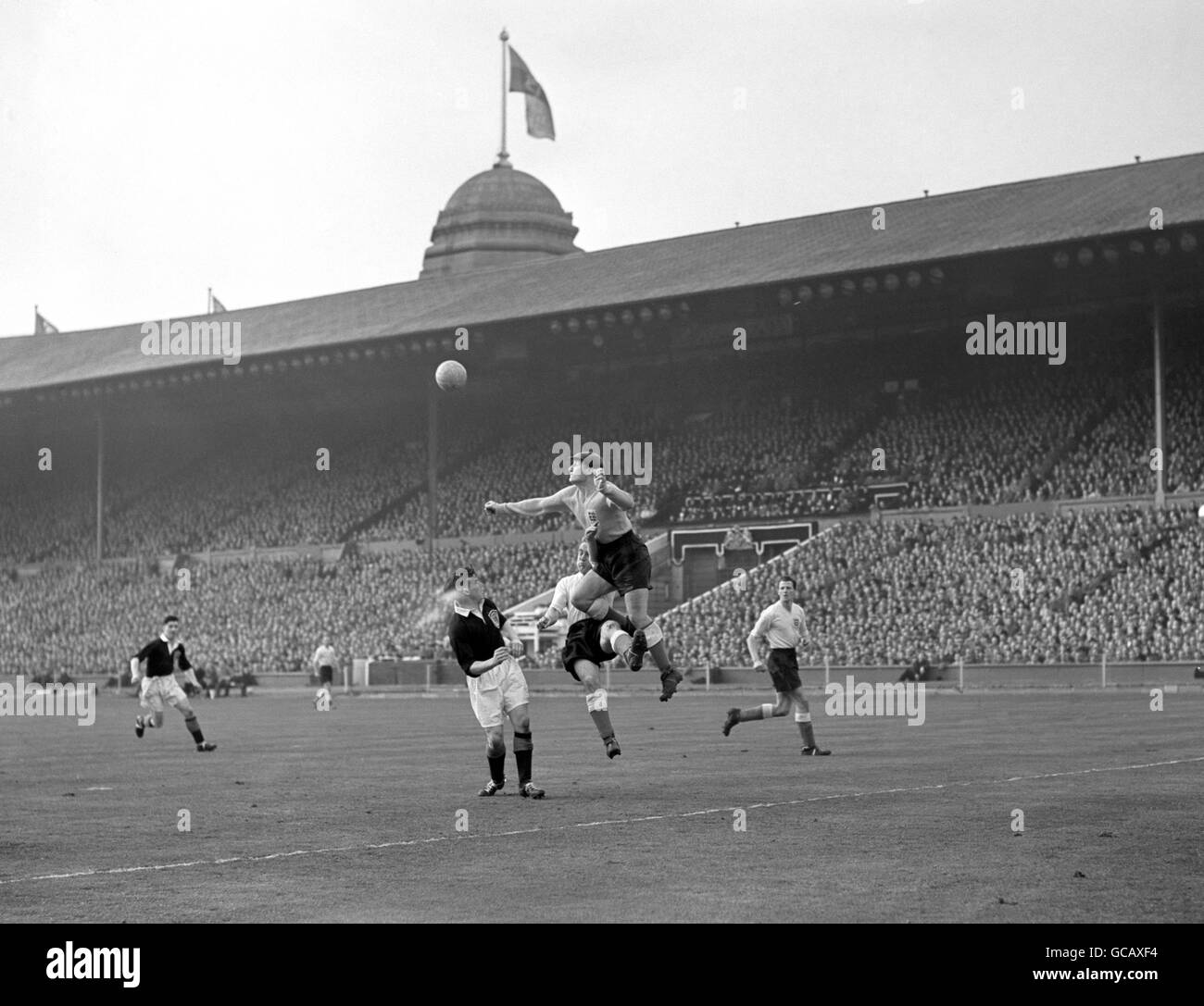 England goalkeeper Bert Williams saves from Scotland's Lawrie Reilly (l) Stock Photo