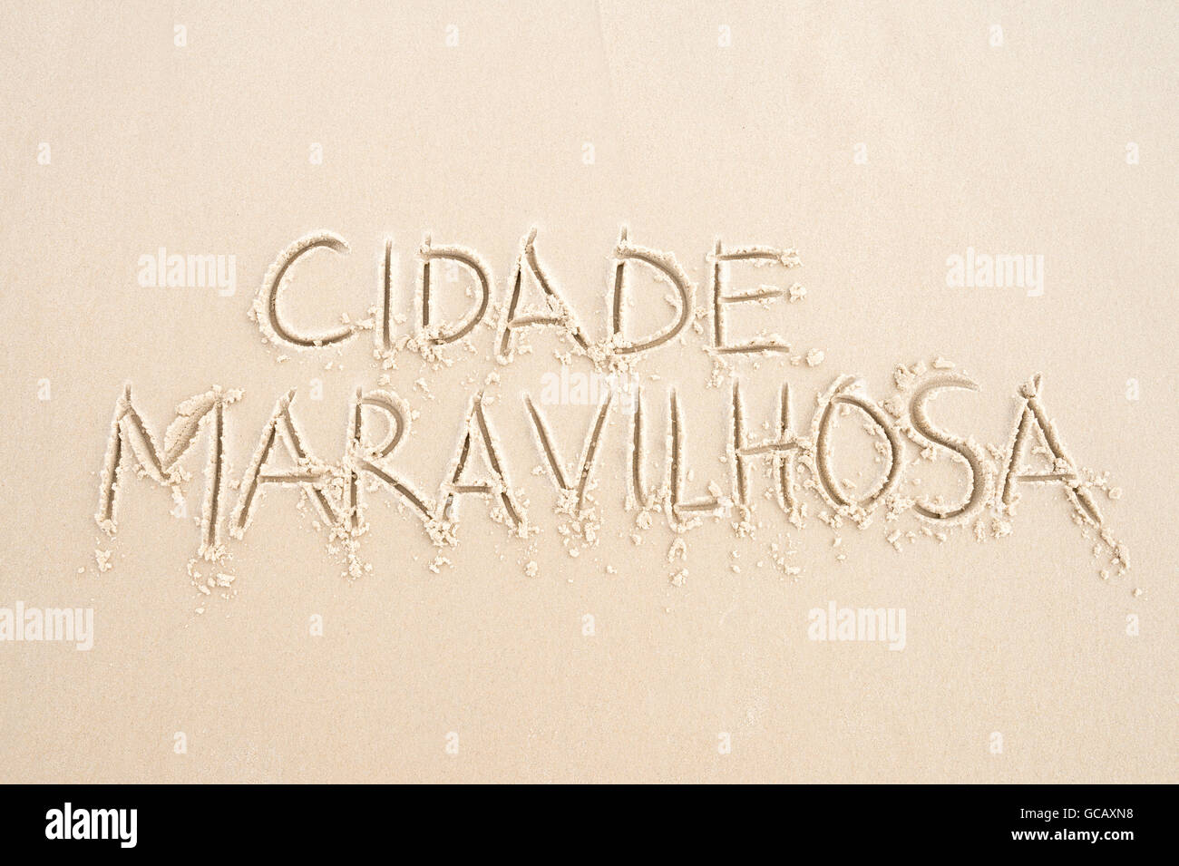 Cidade Maravilhosa (Portuguese for Marvellous City, the nickname of Rio de Janeiro, Brazil) message written in smooth sand Stock Photo
