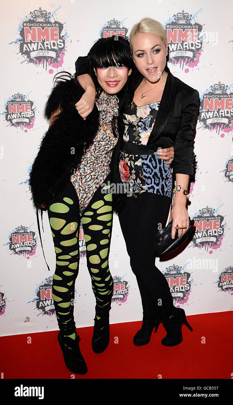 Akiko Matsuura (left) and Jaime Winstone arriving for the 2010 Shockwaves NME Awards at the O2 Academy, Brixton, London Stock Photo