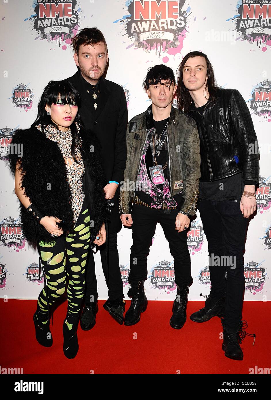Akiko Matsuura, Milo Cordell, Robbie Furze and Leopold Ross of The Big Pink (left to right) arriving for the 2010 Shockwaves NME Awards at the O2 Academy, Brixton, London Stock Photo