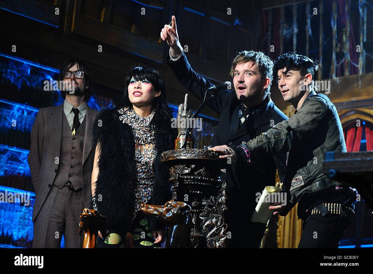 (left to right) Jarvis Cocker, Akiko Matsuura, Milo Cordell and Robbie Furze on stage during the 2010 NME Awards at the O2 Academy Brixton, London Stock Photo