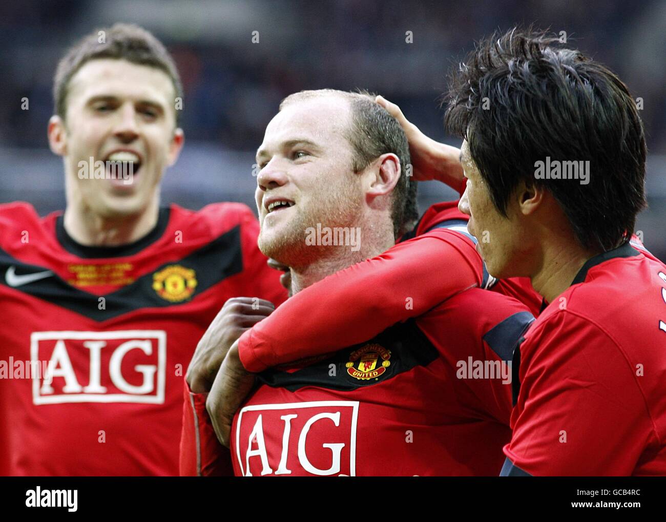 Celebrates scoring with michael carrick hires stock photography and