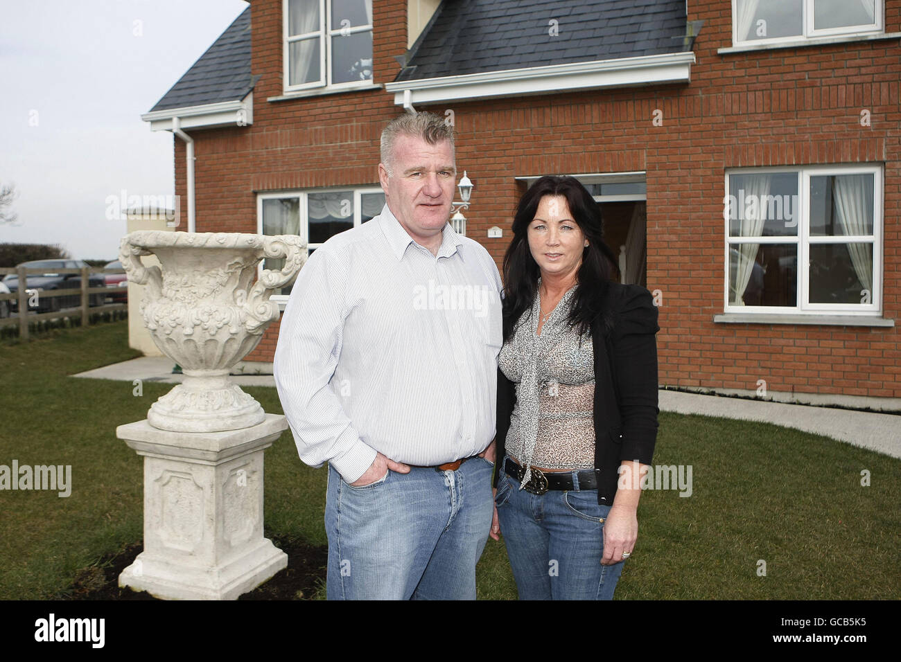 Settled travellers Tony and Geraldine McDonagh at the official hand over of their new home at Newcastle Co Dublin. Stock Photo