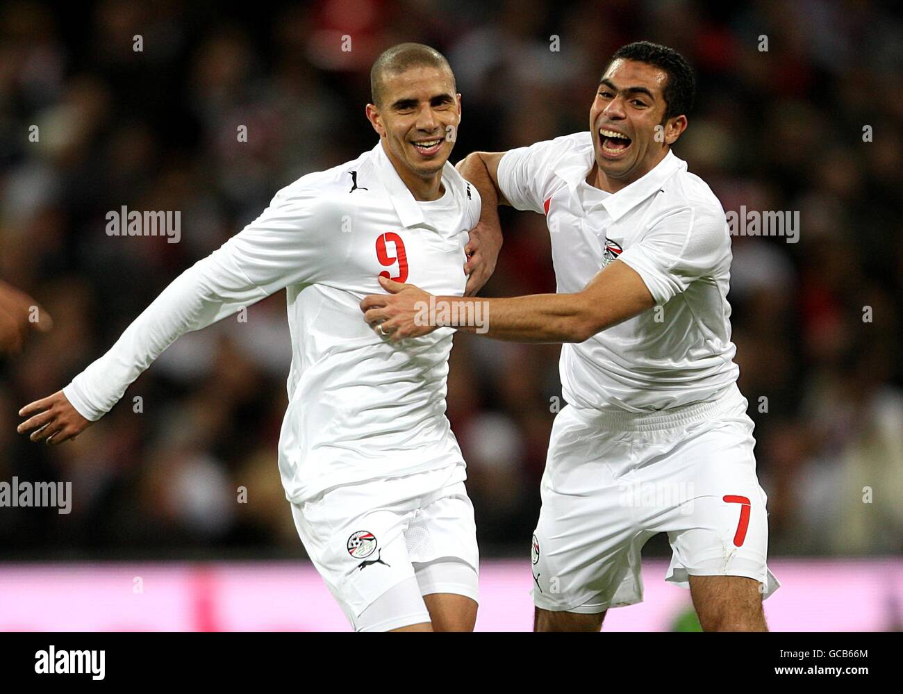 Soccer - International Friendly - England v Egypt - Wembley Stadium. Egypt's Mohamed Zidan (left) celebrates with team mate Ahmed Fathi after scoring his side's first goal of the game Stock Photo