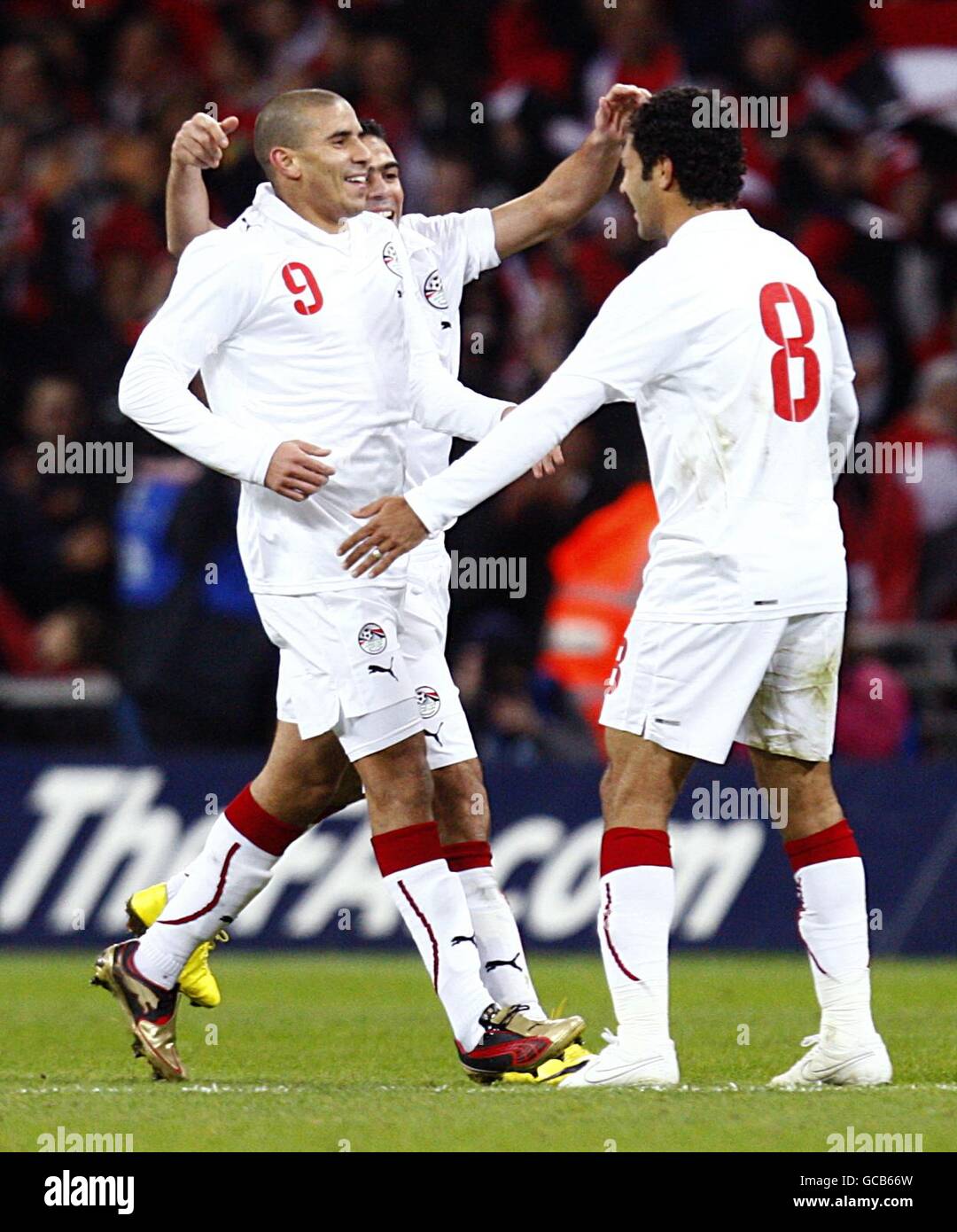 Soccer - International Friendly - England v Egypt - Wembley Stadium. Egypt's Mohamed Zidan (left) celebrates scoring the opening goal with team mate Hosni Abd Rabou (right). Stock Photo