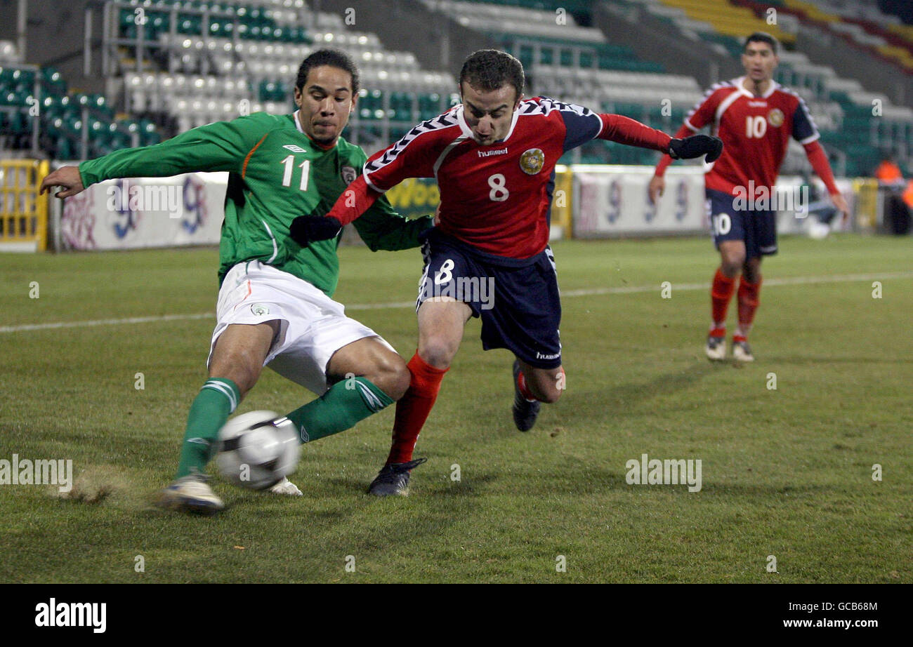 Ireland's Sean Scannell (left) and Armenia's Levon Airapetian battle for the ball during the UEFA Under-21 Championship Qualifying match at the Tallaght Stadium, Dublin. Stock Photo