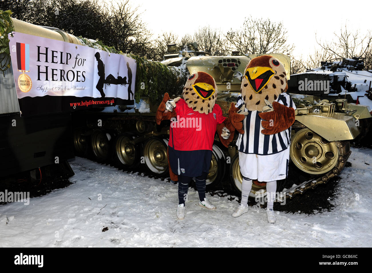 Soccer - Mascots support Help for Heroes - Tanks A Lot - Spring Farm. West Bromwich Albion mascot Baggie Bird (right) and Baggie Bird Junior (left) at the help for heroes tanks a lot day Stock Photo