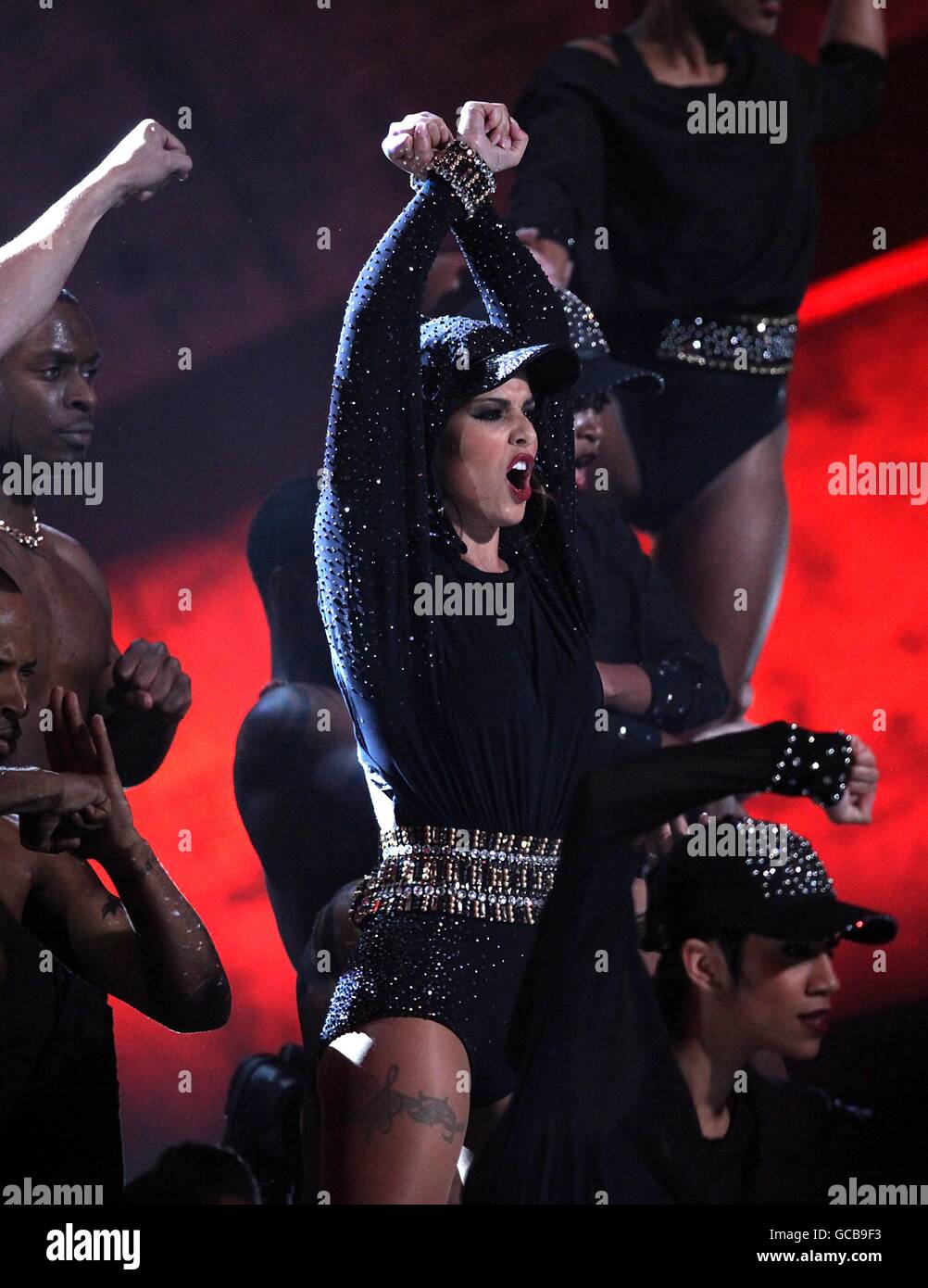 Cheryl Cole performs on stage during the BRIT Awards 2010, at Earls Court,  London Stock Photo - Alamy