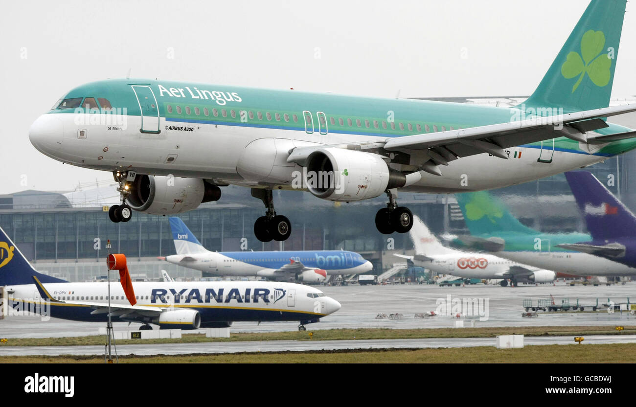 An Aer Lingus Airbus A320 lands at Dublin Airport, as Michael O'Leary's budget airline Ryanair heaped pressure on the Government over the last fortnight claiming he would create 300 high value jobs at the airport if hangar six was handed over to his airline. Stock Photo