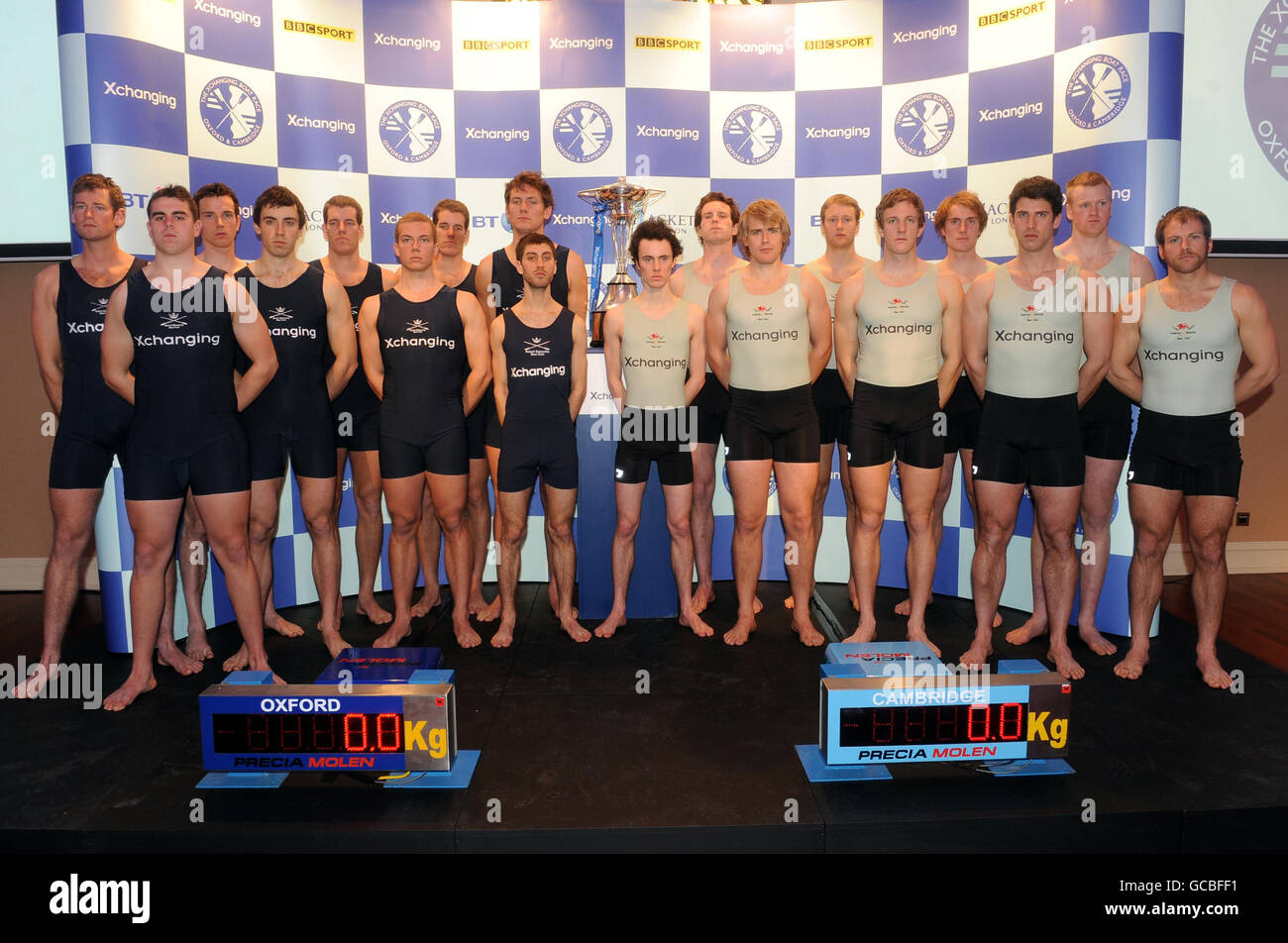 Boat race crews Oxford (left) and Cambridge (right) on stage following the traditional weighin