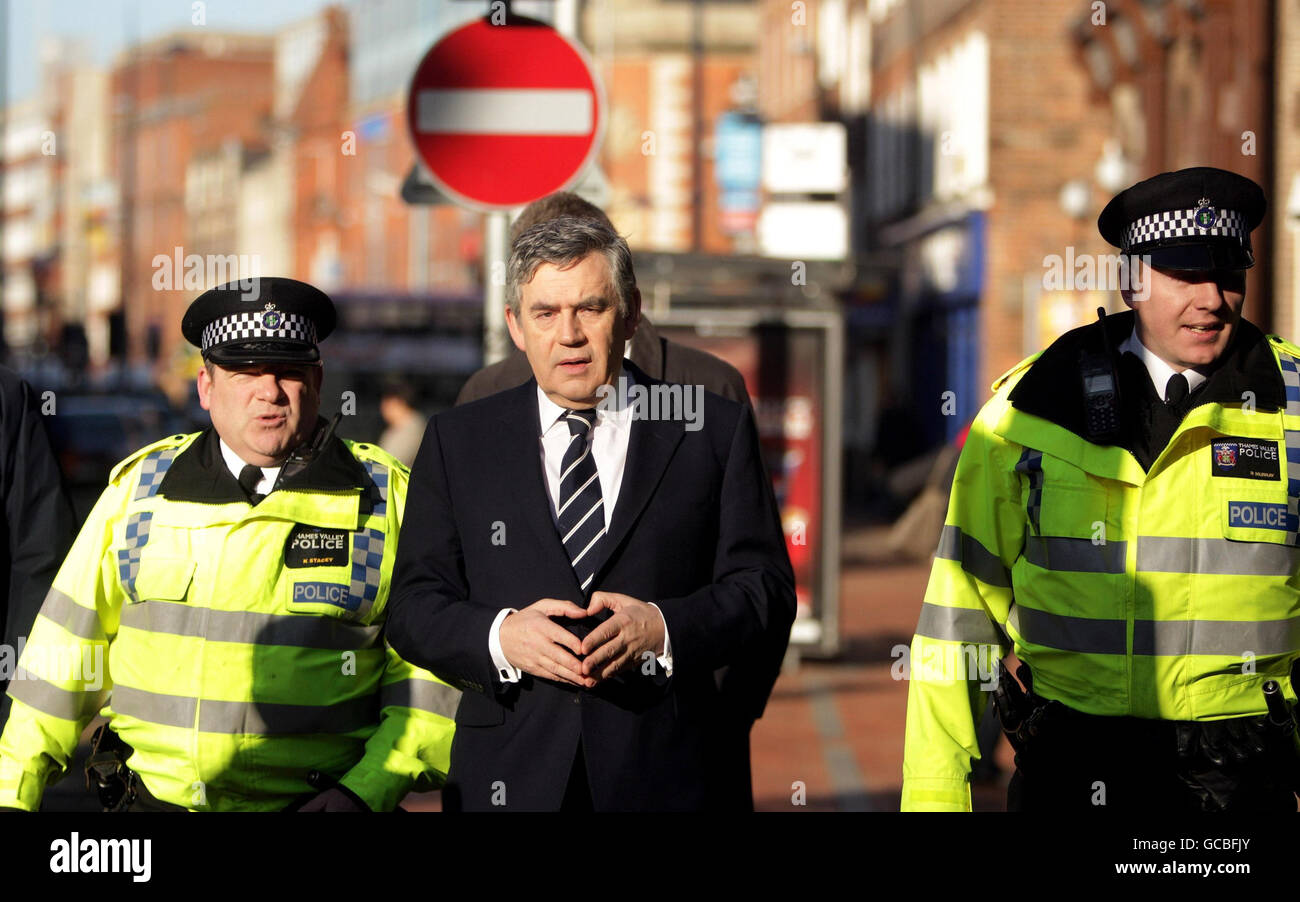 Prime Minister Gordon Brown (centre) arrives in Reading to deliver a