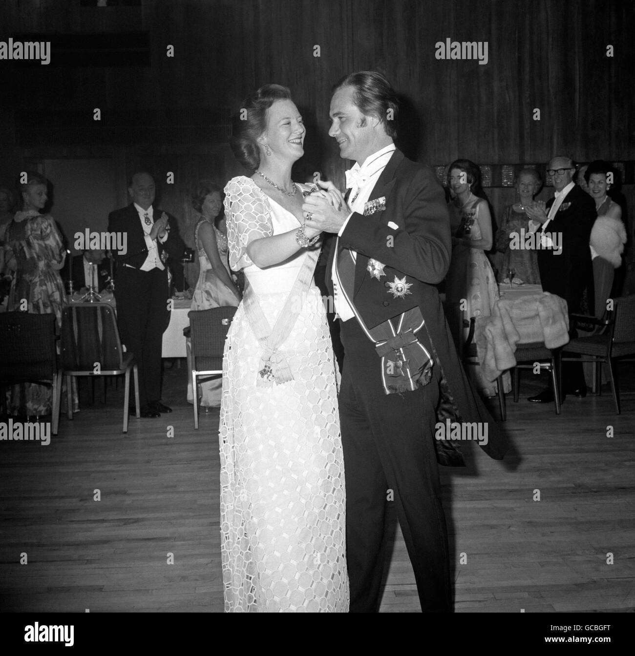 Queen Margrethe of Denmark opens the dancing with her husband, Prince Henrik of Denmark, at the Anglo-Danish Society's Jubilee dinner and dance at teh Royal Garden Hotel. Stock Photo