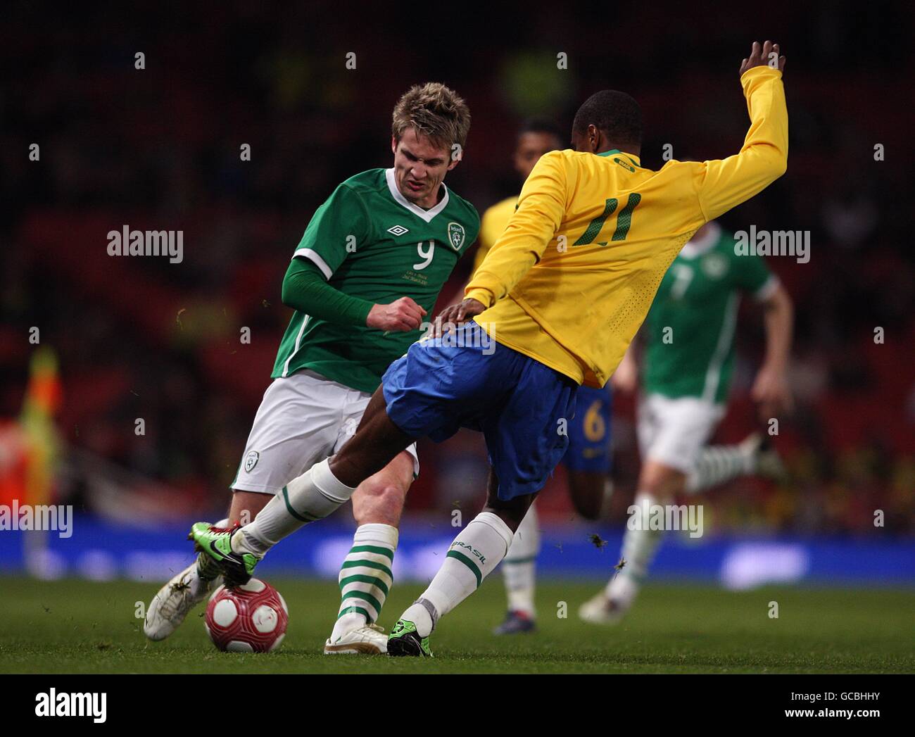 Soccer - International Friendly - Brazil v Republic of Ireland - Emirates Stadium. Robinho (right) battle for the ball. Stock Photo