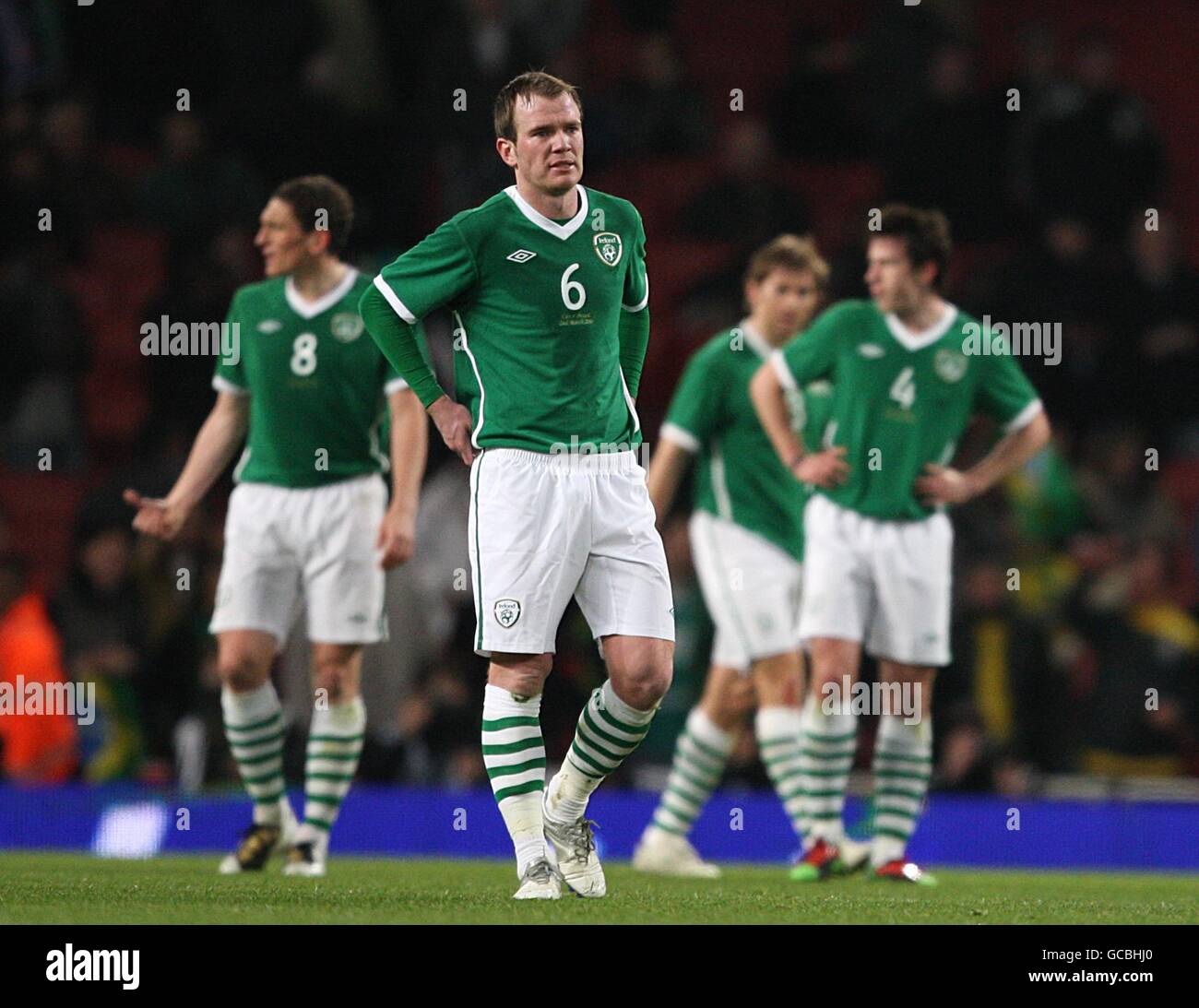 Republic of Ireland's Glenn Whelan appears dejected after his team mate Keith Andrews scored an own goal. Stock Photo