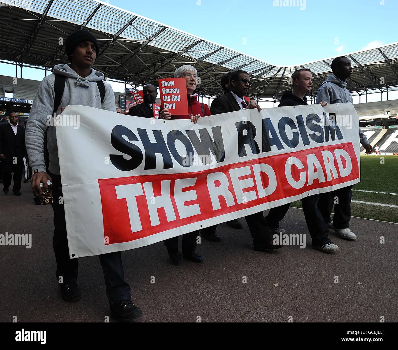 Fans parade a banner saying Show Racism the Red Card before kick off ...