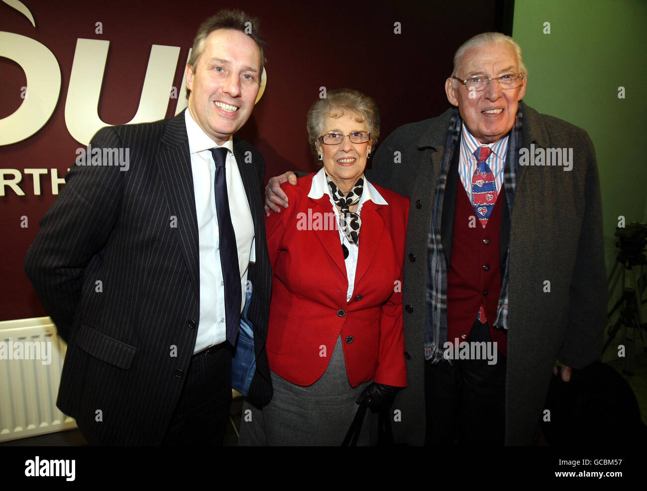 Ian Paisley Jnr (left) with his mother Eileen and Ian Paisley Snr, in