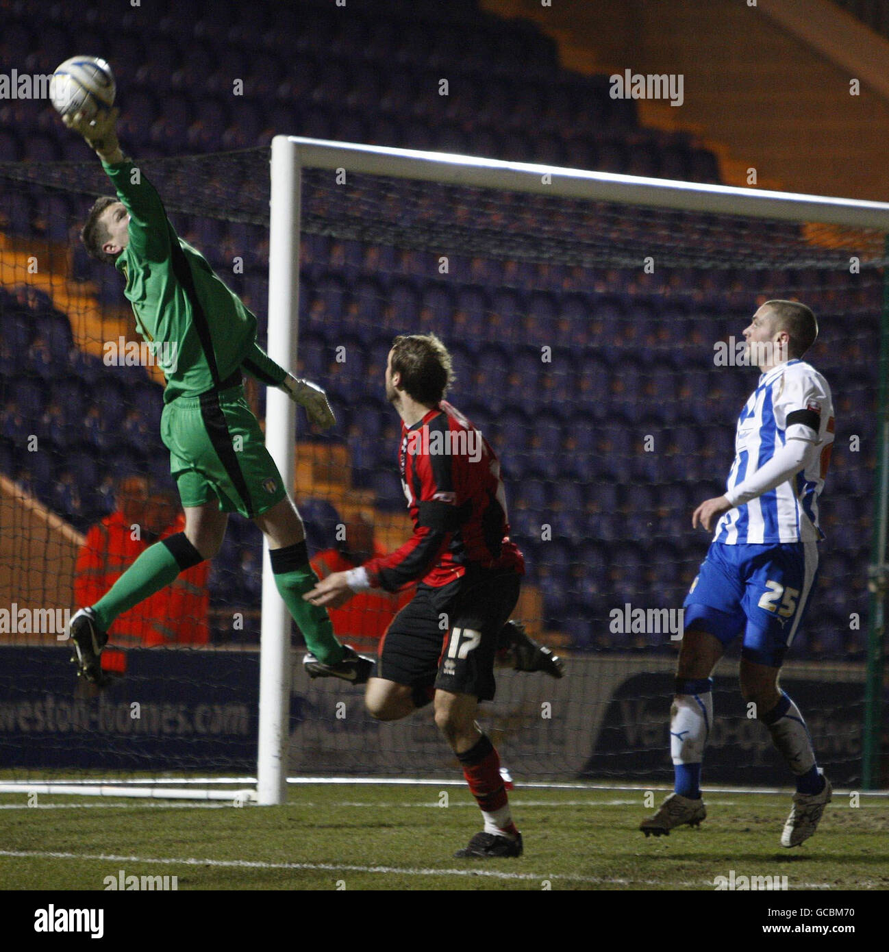 Colchester's goal keeper Ben Williams makes a save during the Coca-Cola League One match at the Weston Homes Community Stadium, Colchester. Stock Photo