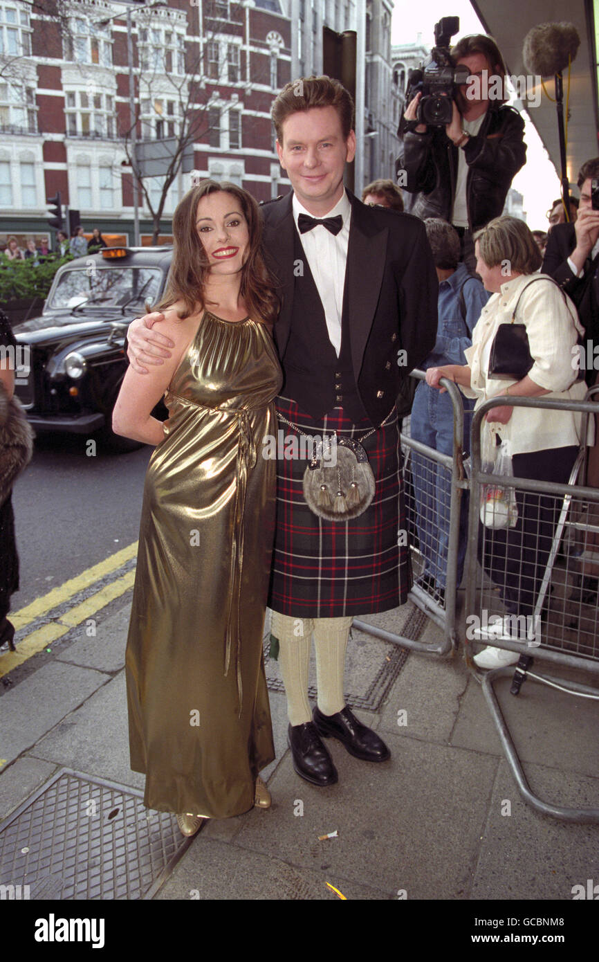 RUTHIE HENSHALL AND JOHN GORDON SINCLAIR ARRIVE AT THE SHAFTESBURY THEATRE FOR THE LAURENCE OLIVIER AWARDS CEREMONY. THE PAIR, WHO FELL IN LOVE BEHIND THE SCENES OF THE SHOW 'SHE LOVES ME', SCOOPED FIVE ACCOLADES BETWEEN THEM. Stock Photo
