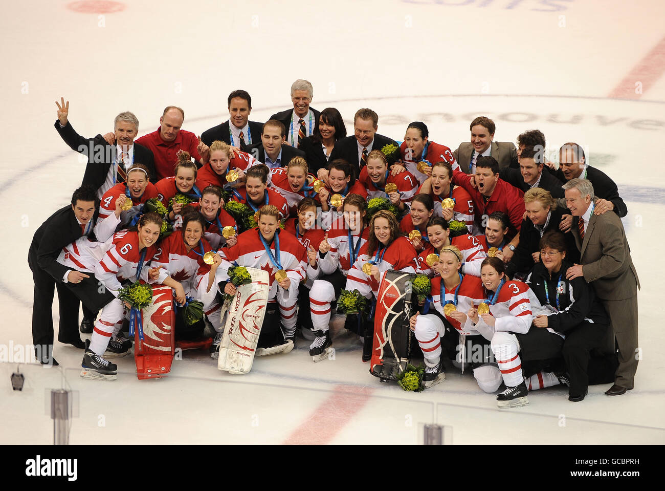Canada's Gold medal winning team celebrate with their gold medals Stock Photo
