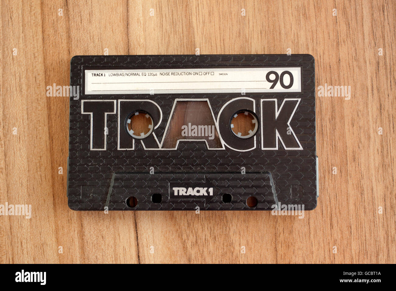 Vintage Cassette tape on wooden background, old technique. Stock Photo