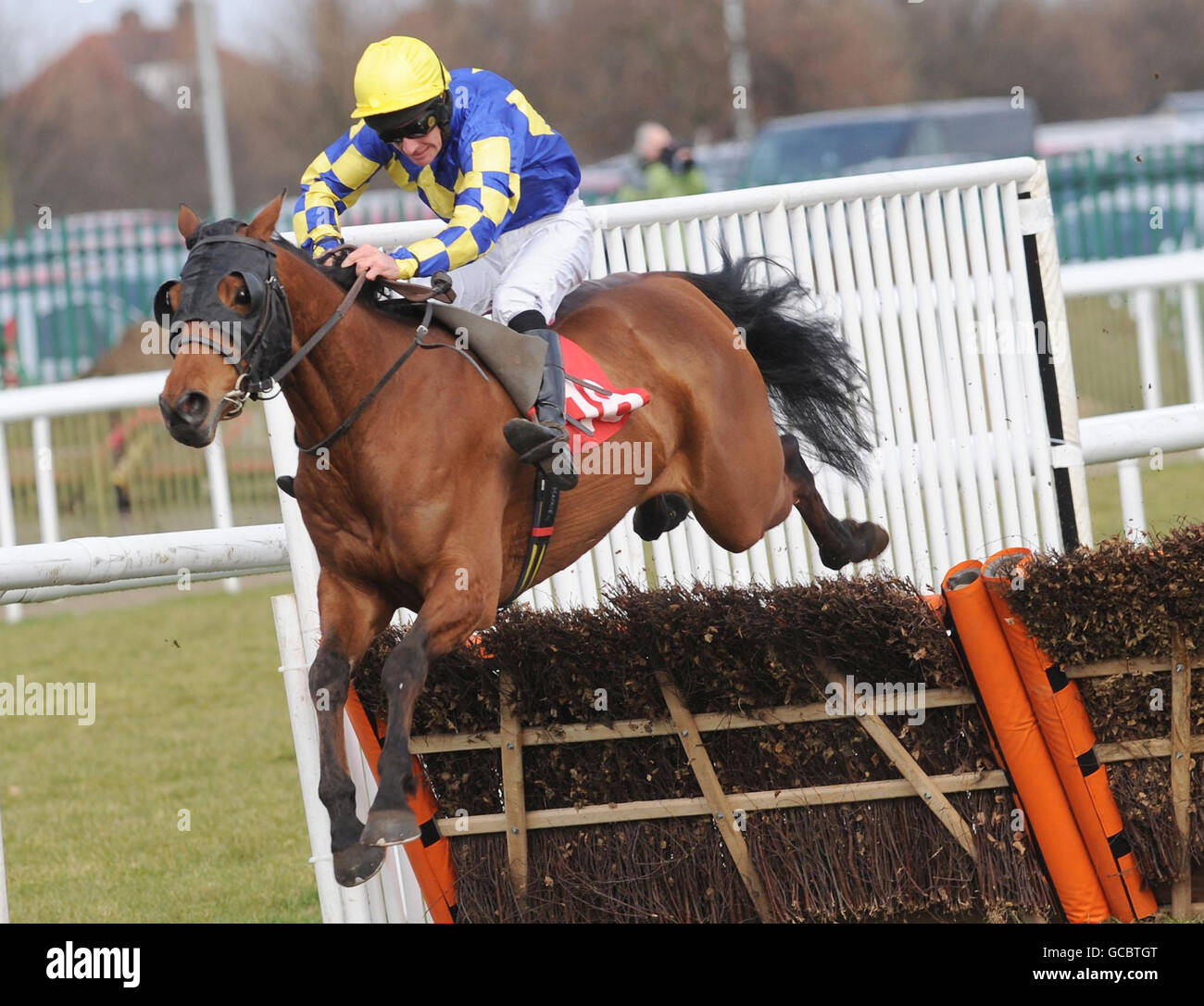 knight in Purple and Richard McGrath clear the final hurdle on their way to victory in the sportingbet.com Novices Hurdle at Doncaster Racecourse, Doncaster. Stock Photo