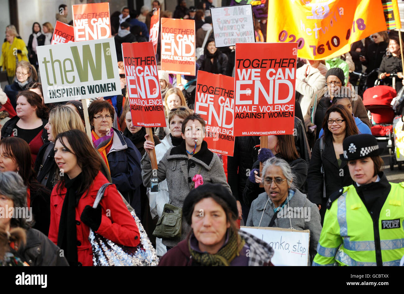 End violence against women placard hi-res stock photography and images ...