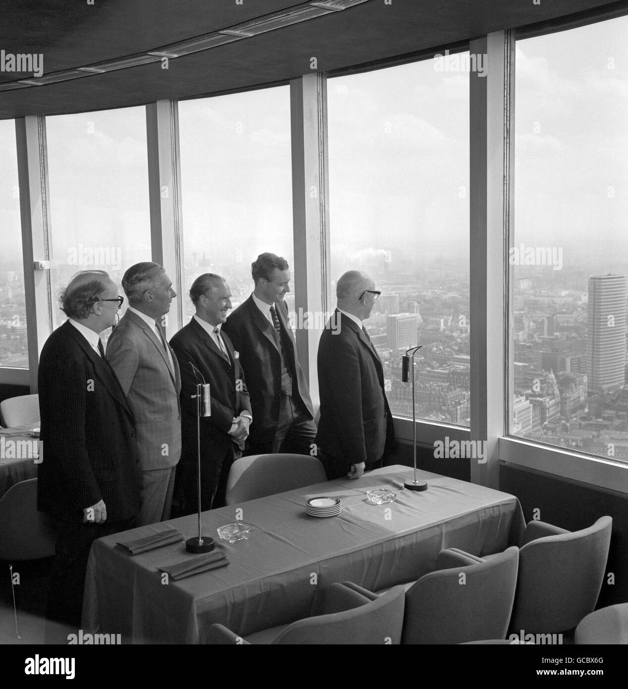 Postmaster-General Anthony Wedgwood Benn, showing the futuristic new GPO Tower to former Postmaster Generals. He entertained them to lunch in the restaurant at the top of the tower. left to right, Lord Listowel, Reginald Bevins, Ernest Marples, Anthony Wedgwood Benn and Ness Edwards. Stock Photo