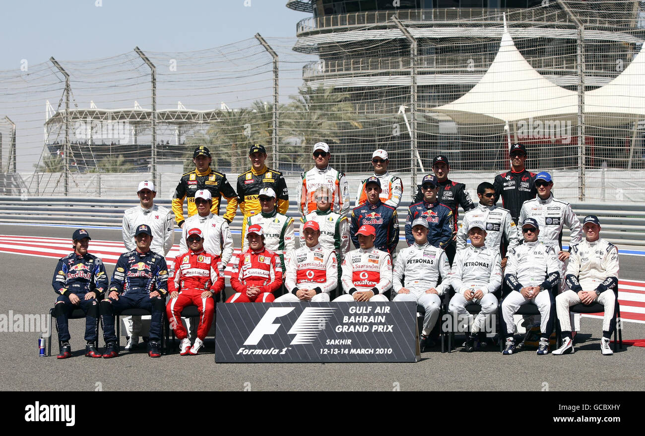 Drivers pose for the annual start of season team group picture prior to during the Gulf Air Bahrain Grand Prix at the Bahrain International Circuit in Sakhir, Bahrain. Stock Photo