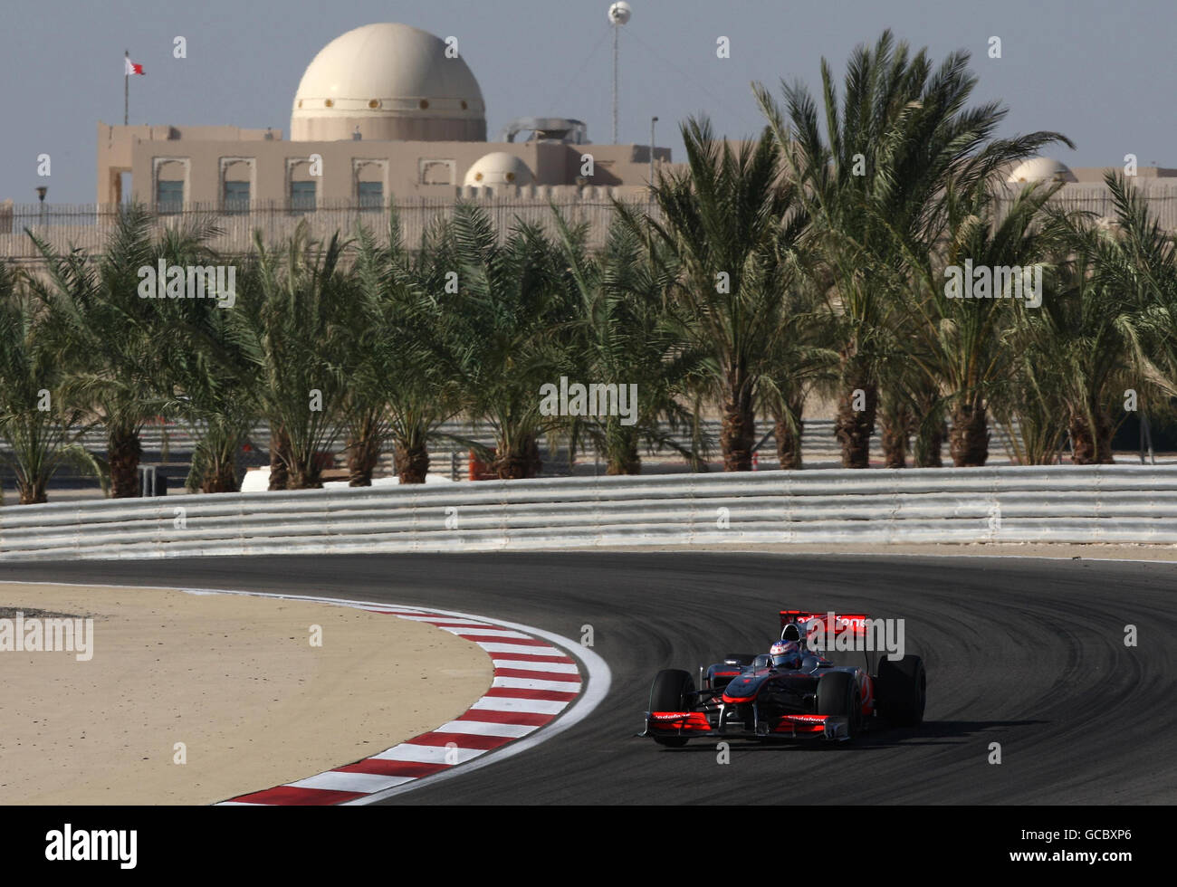 Mclaren driver Jenson Button on his way to 7th place during the Gulf Air Bahrain Grand Prix at the Bahrain International Circuit in Sakhir, Bahrain. Stock Photo