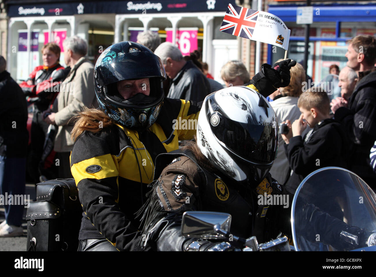 Bikers take part in a mass motorcycle ride in aid of the charity Afghan Heroes, they set off from Hullavington Airfield and passed through Wootton Bassett, in Wiltshire, to honour troops killed in Afghanistan. Stock Photo