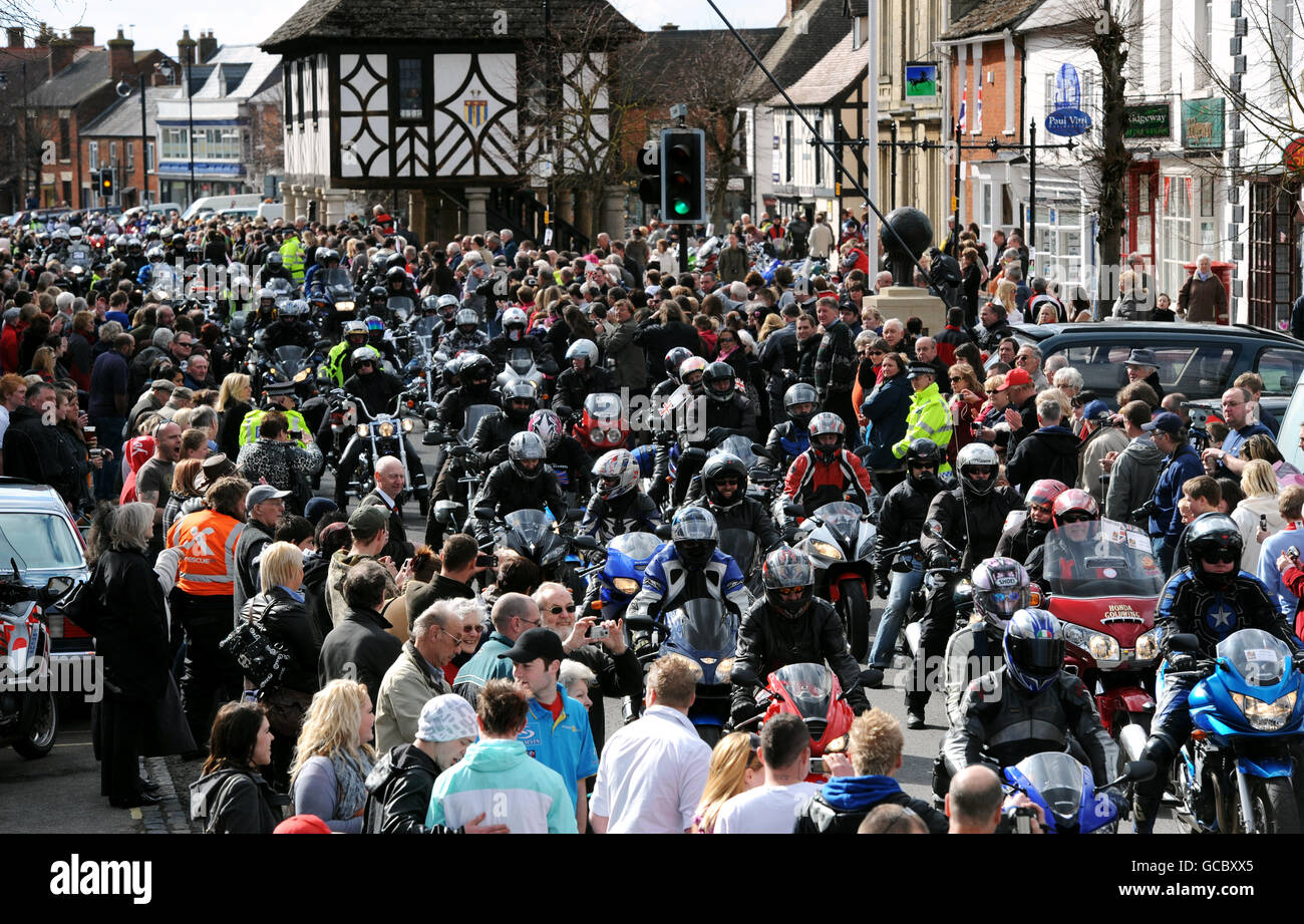 Crowds gather to show their support as bikers take part in a mass motorcycle ride through Wootton Bassett, in Wiltshire, in aid of the charity Afghan Heroes to honour troops killed in Afghanistan. Stock Photo