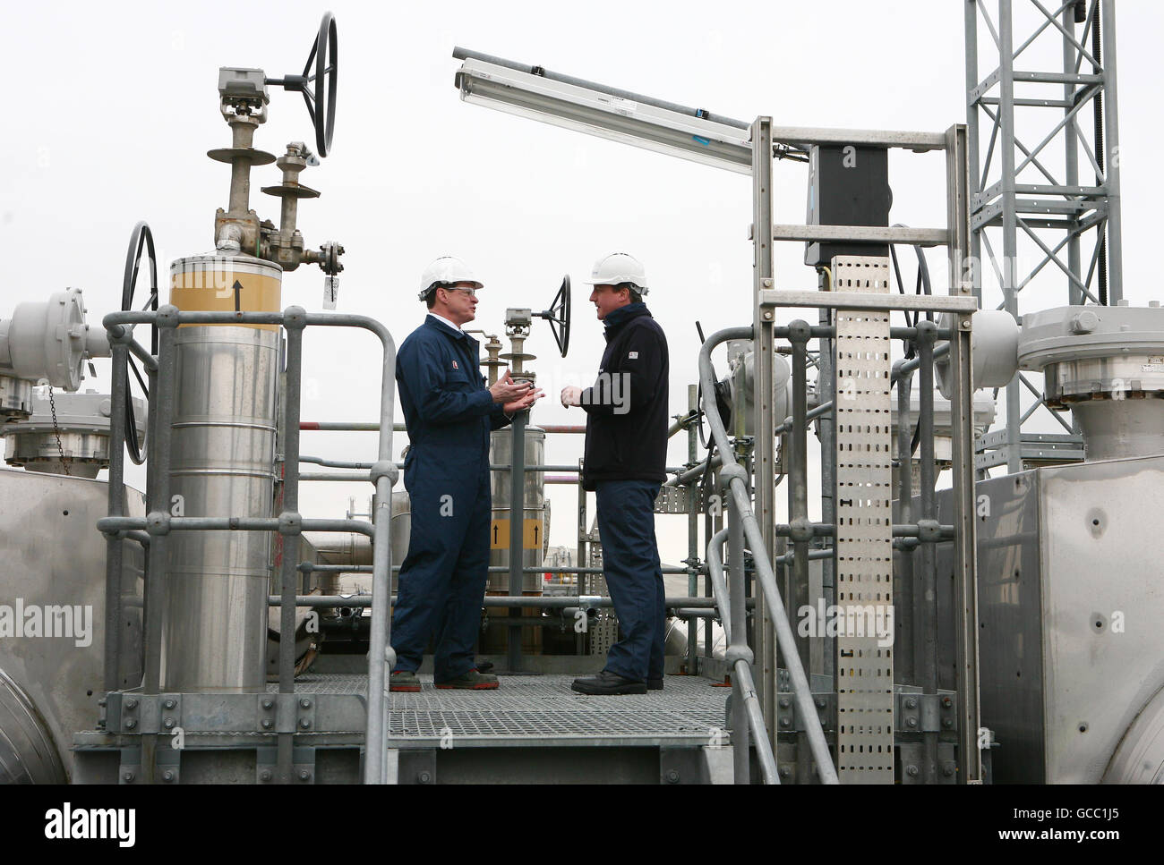 Conservative Party Leader David Cameron (right) is shown around the National Grid Grain LNG site in Grain, Kent, by Steve Holliday, C.E.O of National Grid as the Conservative Party launch their Energy Security Green Paper. Stock Photo