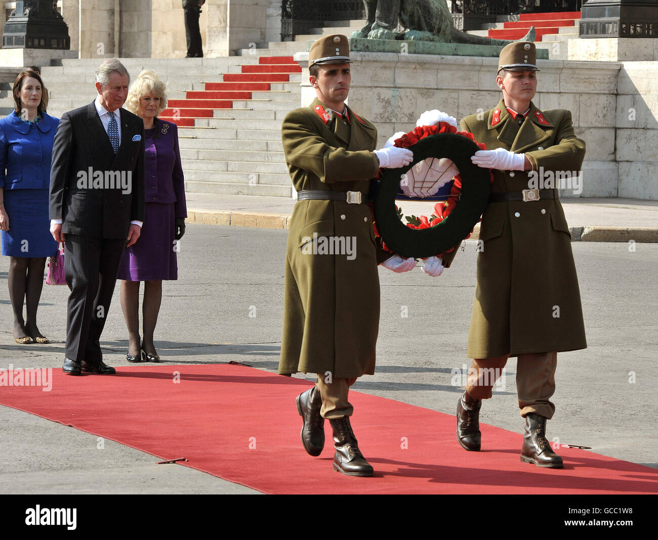 The Prince of Wales follows two Hungarian Soldiers to lay a wreath at the National War Memorial in Budapest, Hungary. Stock Photo
