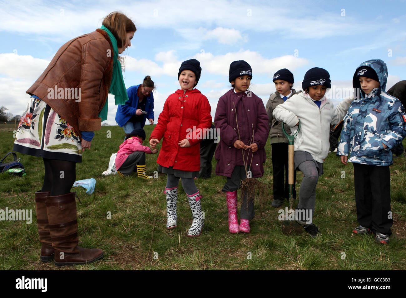 Princess Beatrice of York talks with children from Highfields