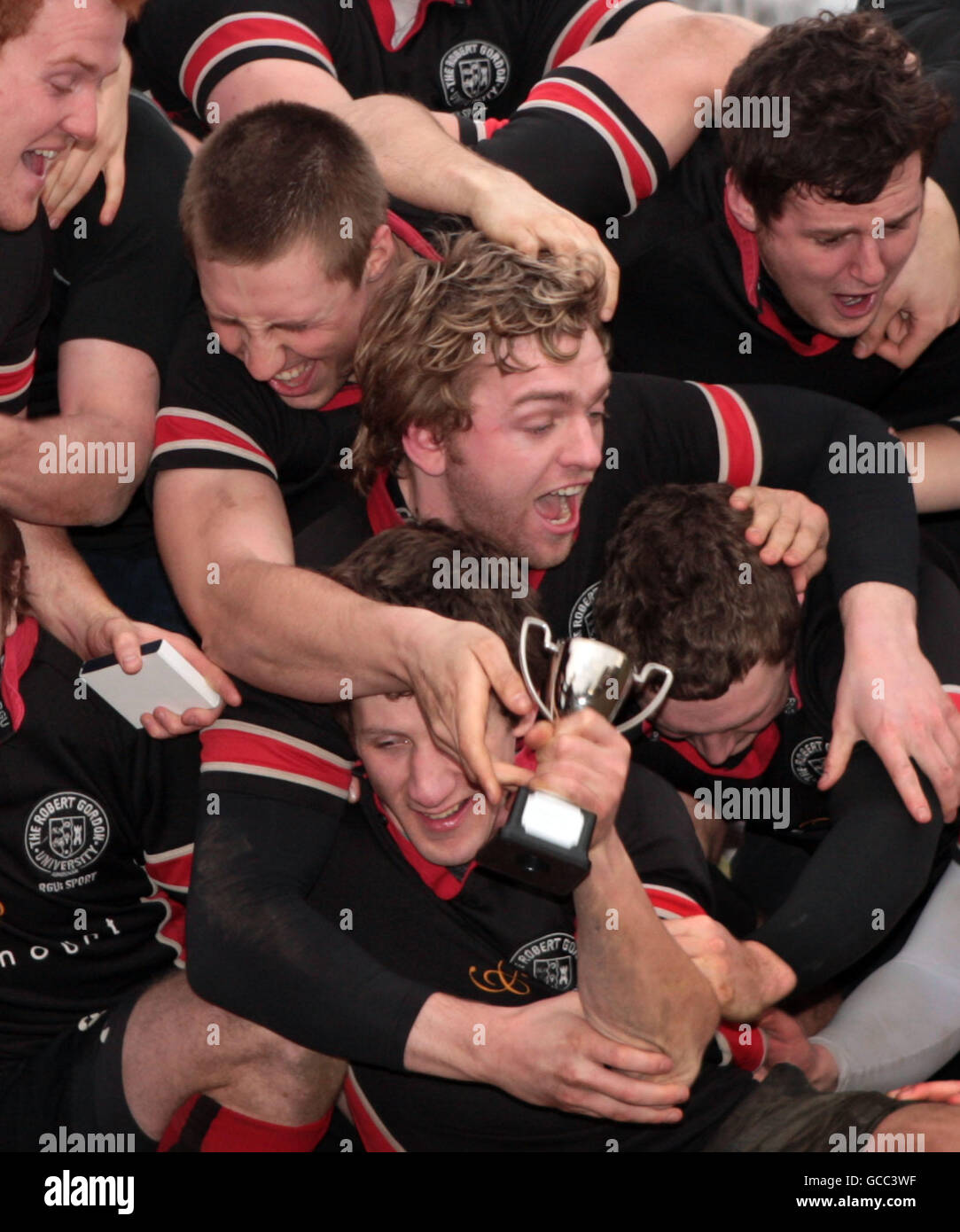 Aberdeen celebrate their victory with the trophy during the Universities and Colleges Cup Finals at Wardie Playing fields, Edinburgh. Stock Photo