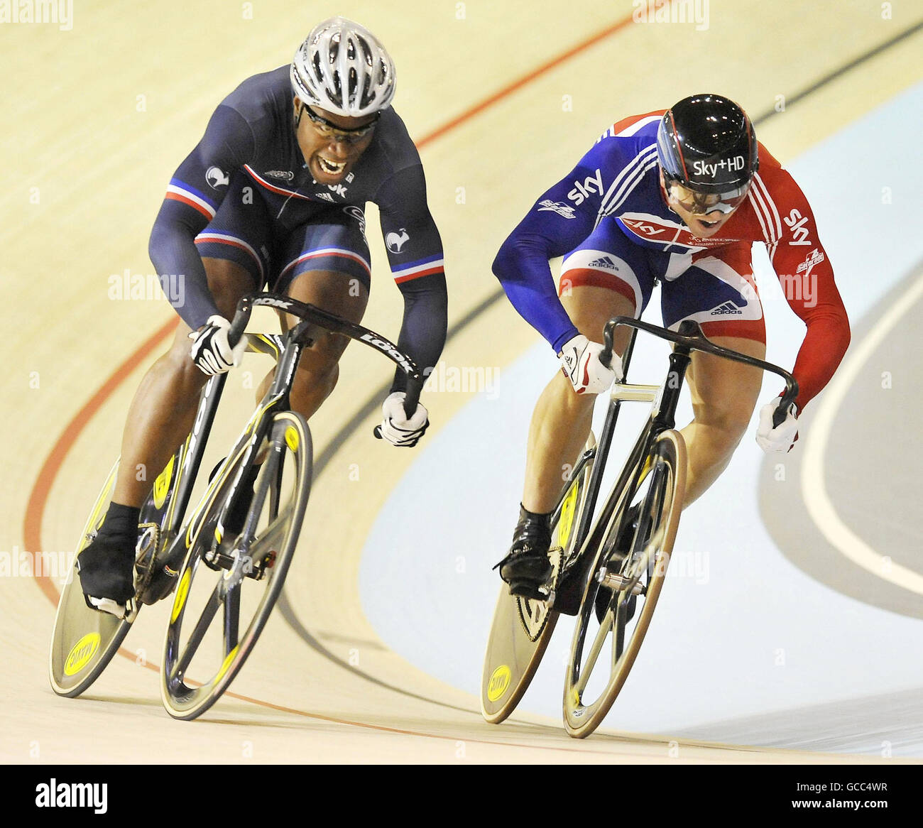 France's Gregory Bauge (left) rides to knock out Great Britain's Sir Chris Hoy in the sprint 1/4 final during the World Track Cycling Championships at the Ballerup Super Arena, Copenhagen, Denmark. Stock Photo
