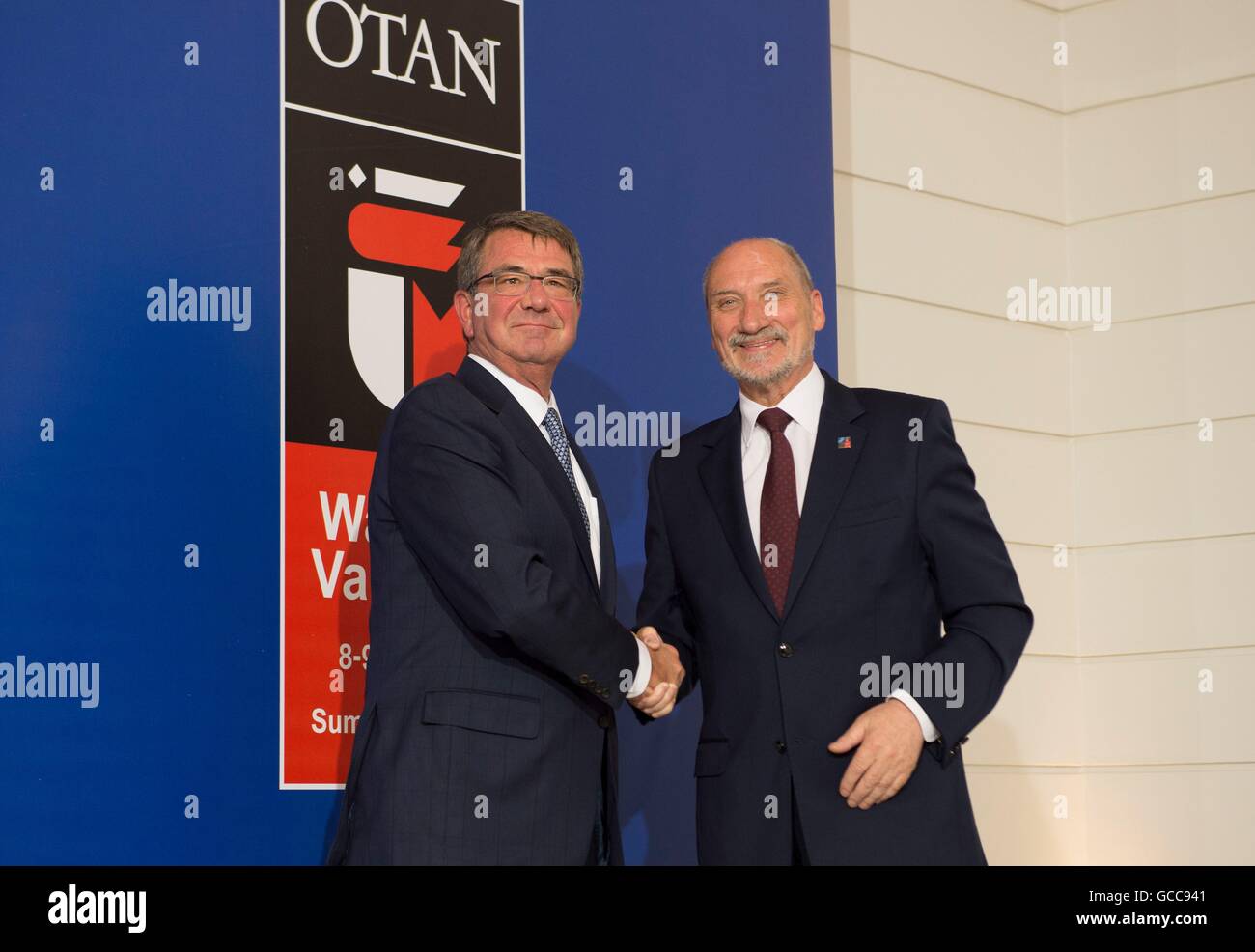 U.S Secretary of Defense Ash Carter shakes hands with Polish Minister of Defense Antoni Macierewicz during the NATO Summit meeting July 8, 2016 in Warsaw, Poland. Stock Photo